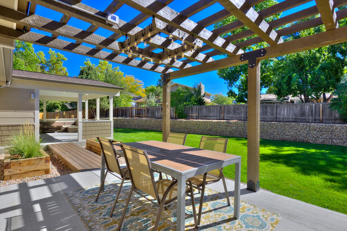 Outdoor Dining with Bridge to Patio Cover
